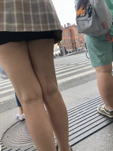 Closeups of a gorgeous girl wearing spandex mini shorts crossing the street