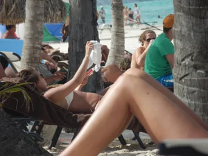 Bikini babe at the beach with nice tits and ass
