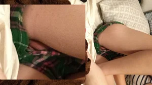 Girl lying in bed in shorts lip slip pic