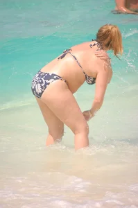 Various sexy candid girls in bikinis at the beach