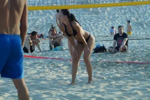 Hot Tattooed Girl in Black Swimsuit Playing Volleyball on the Beach Creepshot Photos Gallery