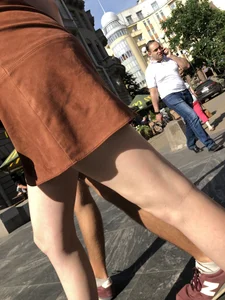 Hot pale legs closeup on the street