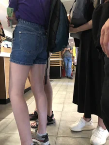 Hot Bare Legs in Blue Denim Shorts Closeup Candid Pics Gallery in the Cafe Line