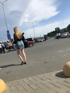 Nice candid girl in a jean skirt with hot legs