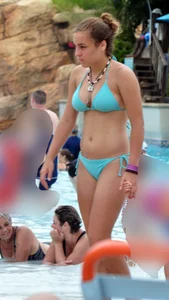 Cute girl with nice body in her teal bikini in Florida