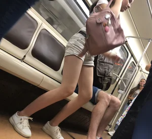 Cute Teen Girl in Shorts in Subway Train Candid Photos