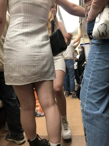 Group of Teens in Short Dresses in a Subway Train and on an Escalator Gallery