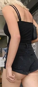 Girl in mini shorts closeup, nice ass