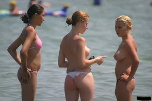 Sexy candid topless and nude beach girls