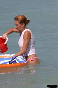 Beach voyeur girls in bikinis, thongs and topless