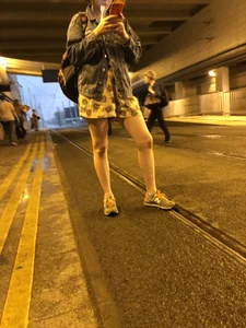 Cute candid girl in a dress with nice legs
