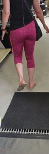 Milf shopping with a nice ass in tight maroon leggings