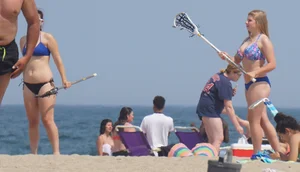 3 girls on the beach in bikinis with big boobs, one brunette and two blondes