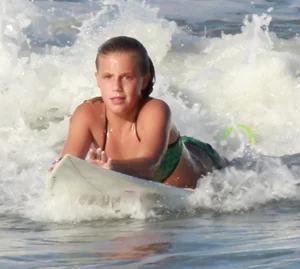 Hot surfer chicks out in the water