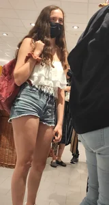 Teen with sexy legs in short jean shorts