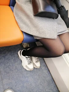 Cute Redhead in Black Pantyhose Sitting in Public Train Candid Photos
