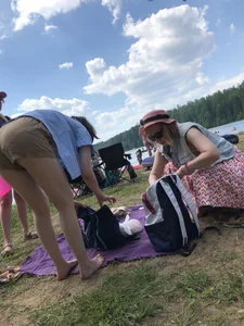 Barefoot Candid Girl in Shorts Bending Over at the Beach Unpacking Her Things Before She Undresses Creepshot