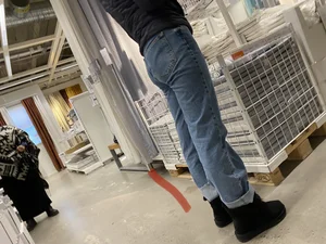 A Masked Candid Girl in Loose Jeans at the Store Creepshots