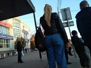 Hot Booty in Jeans Closeup on the Bus Stop