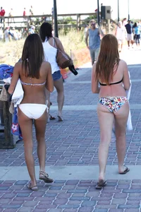 Two cute teens in bikinis