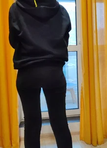 Candid chick wearing tight black jeans home closeups