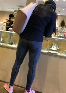 Brunette jewelry shopping in leggings with a nice ass