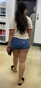 Same sexy little Latina with a nice round booty in jean shorts