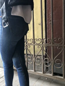 Closeup of hot ass in tight blue jeans