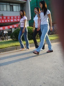 Cute Asian girl with a nice booty in tight jeans