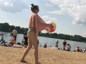 A Hot Candid Milf in a Swimsuit Playing Ball at the Beach Creepshots Gallery