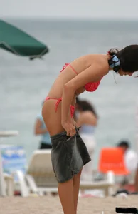 Beach voyeur girls in bikinis, thongs and topless
