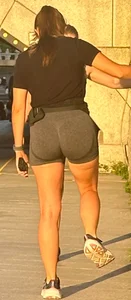 Girl exercises her cute butt in public at sunset