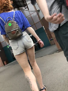 A Gorgeous Tall Ginger Girl in Shorts And Sandals With Tattooed Legs Street Creepshots
