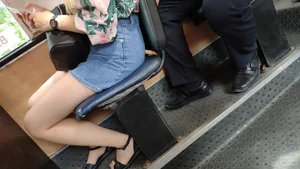 Girl with Hot Legs Dressed in Sandals, Denim Skirt and Flowery Blouse Sitting in a Public Bus Candid