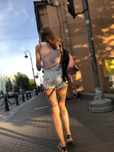 Skinny Girl in Denim Shorts With Fit Tattooed Legs Street Creepshots Gallery
