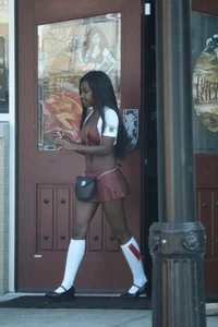 Sexy ebony Tilted Kilt employee in her uniform