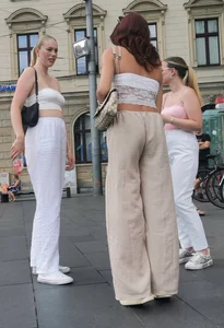 Long blonde braless in a white outfit (many pictures)