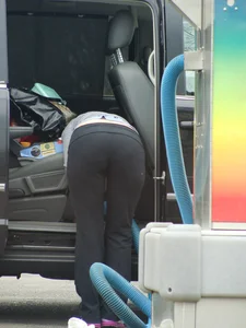 Girls cleaning their cars in jeans and pants
