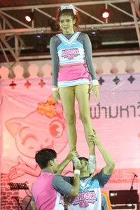 Bunch of athletic Thai cheerleaders at a competition