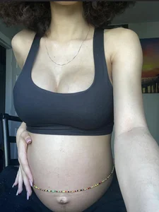 Pregnant Girl in a Top Selfie