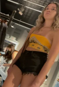 T33ns shopping denin short close up