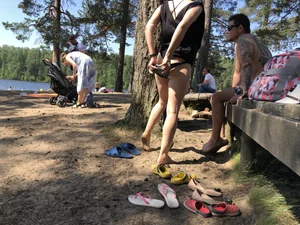 Candid Girl Putting On Swimsuit and Undressing at the Forest Lake Beach Gallery