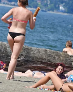 Group of sexy girls in bikinis at the beach