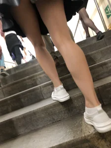 Awesome Candid Girl in a Leather Skirt And Sneakers Walking Down a Street, Then Flashing Her White Panties on the Stairs Creepshots Gallery