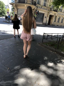 Cute candid girl in pink shorts street photos