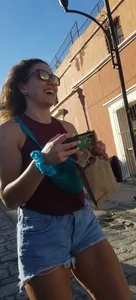 Laughing girl in shorts, legs and thick peach