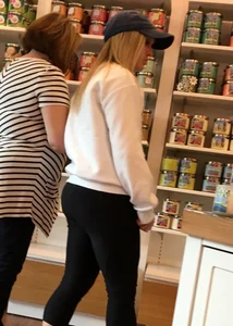 Thick blonde shopping in leggings with a nice booty