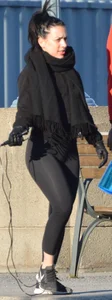 Brunette walking in leggings with a thick booty and showing some camel toe