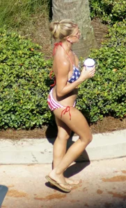 Blonde babe at the pool with sexy body in USA bikini
