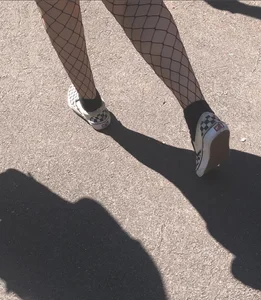 Legs in Fishnet Pantyhose Street Candid Closeup